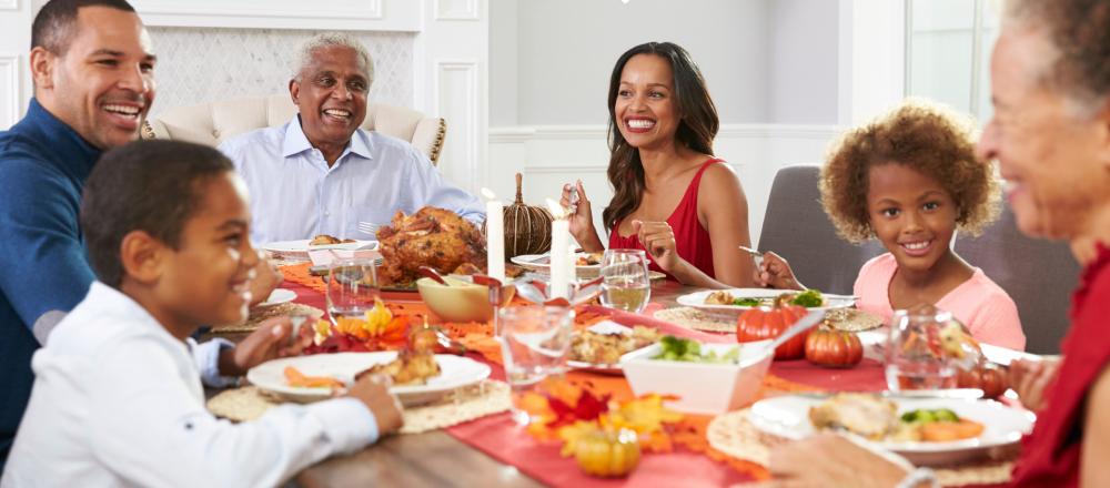 family eating Thanksgiving meal