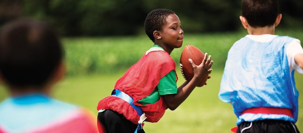 Boys playing Flag Football