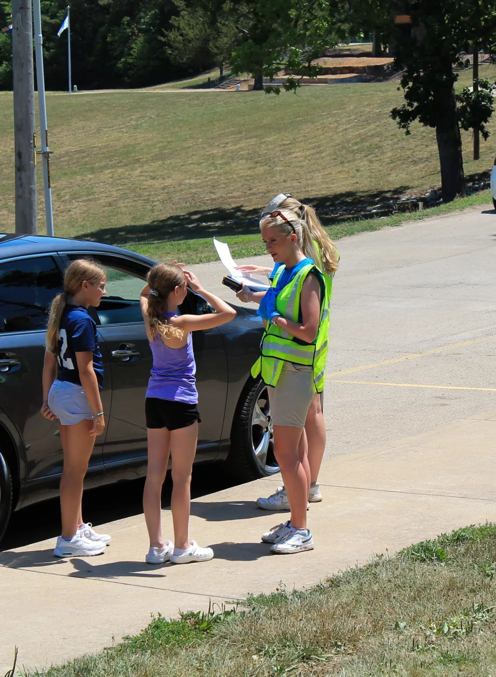 two young campers at camp check-in for ymca camp lakewood