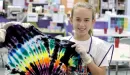 Thumbnail: Teen girl tie dying a tshirt