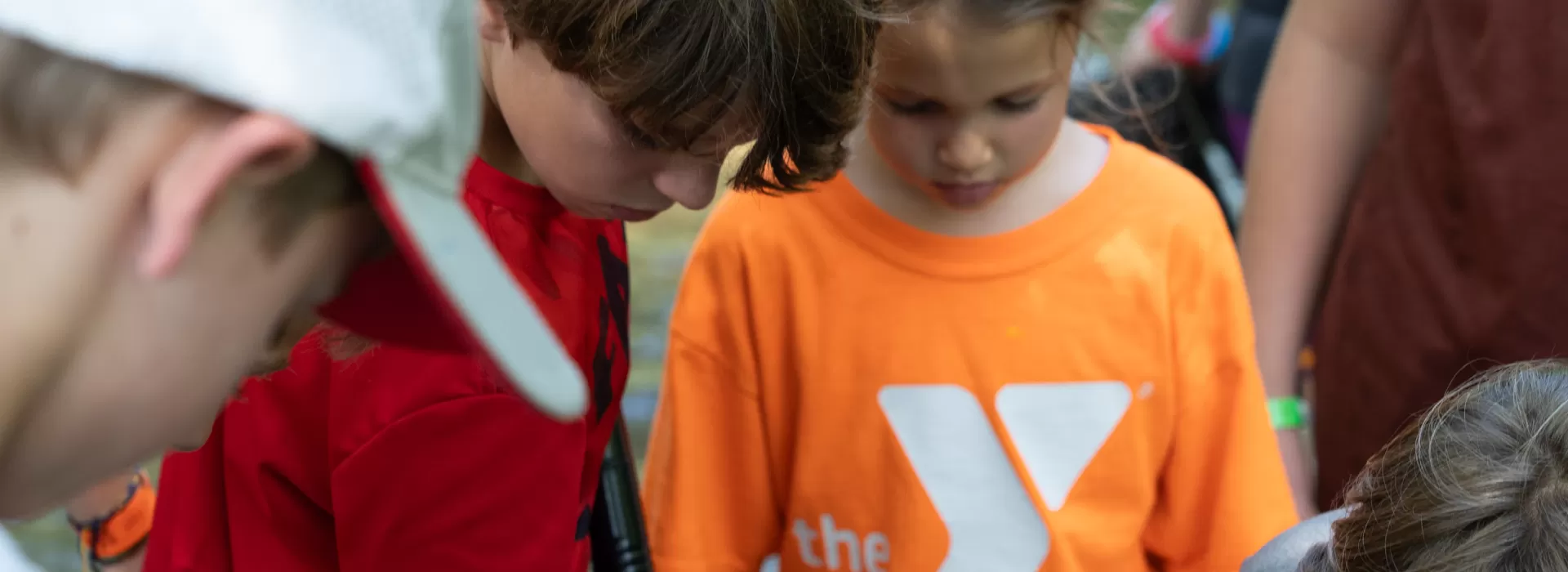 Young campers observing something